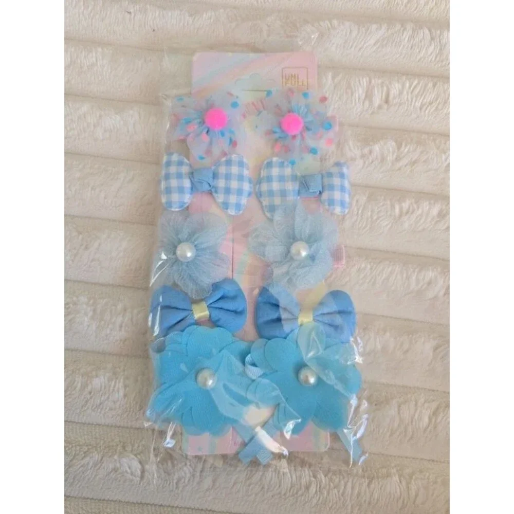 Set of 10 blue bow and flower hair clips